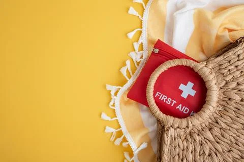 First aid kit in beach bag for summer safety Stock Photos