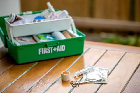 First aid kit on the table Stock Photos