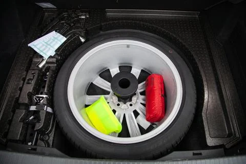First aid kit in the trunk of the car Stock Photos