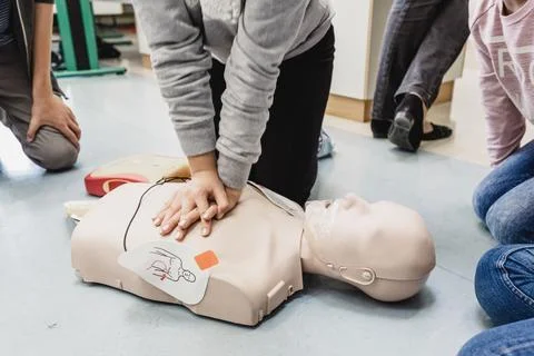 First aid resuscitation course using AED. Stock Photos