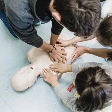 First aid resuscitation course using AED. First aid cardiopulmonary resusc... Stock Photos