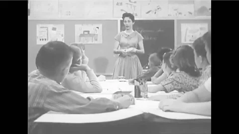 First aid is taught to students as part of a civil defense program in case of a Stock-Footage 116993929