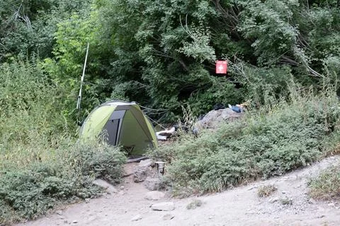 First aid tent along aa popular hiking trail in the mountains Stock Photos