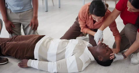First aid, training and man with people in cpr workshop for learning, healthcare Stock Footage 297192288