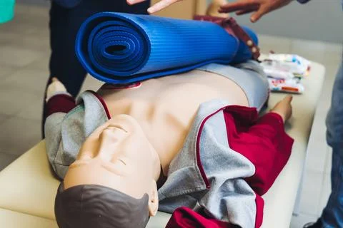 First aid training course with dummy, CPR emergency reanimation procedure o.. Stock Photos