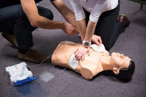 First Aid Training. Defibrillator CPR Practice CPR training medical proced... Foto stock