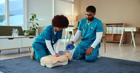 First aid, training or nurse with cpr on dummy for cardiac arrest, emergency 库存影片 300747884