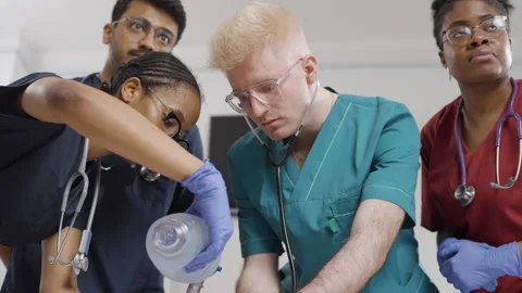First aid training. Students are learning how to use a bag valve mask Video stock 278460717