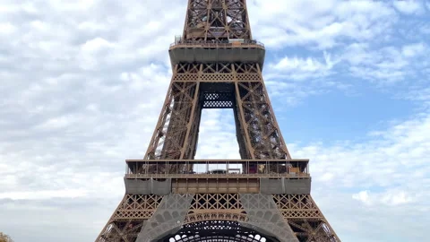 First and second floor of the Eiffel tower on a sunny day in Paris, France Stock Footage 221864630
