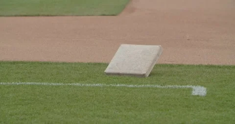 First base sitting on infield during pre-game Video stock 278275455