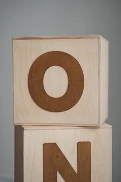 First birthday photo zone setup with wooden ONE blocks and cake stand Stock Photos