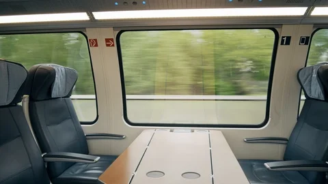First class compartment in a moving high speed train Stock Footage 89960988