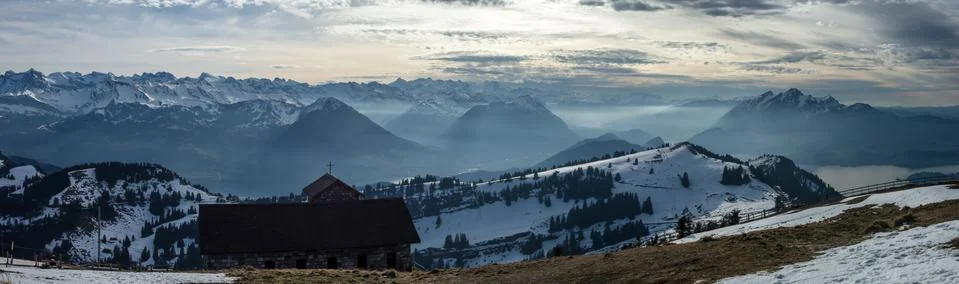 First-class panoramic view from rigi into swiss snowy alps Stock Photos