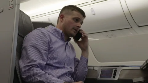 First Class Phone Airplane 4K Stock Footage 89291446