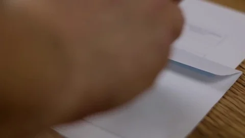 First class stamp on the envelope Stock Footage 72248409