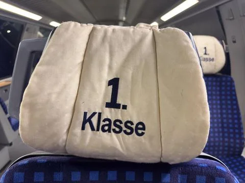 First class train seat headrest on german railway Stock Photos