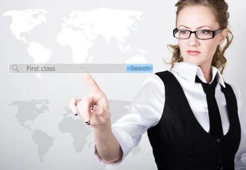 First class written in search bar on virtual screen. Internet technologies in Stockfoto's