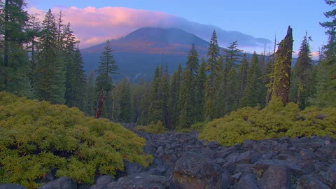 First clouds of pending storm arrive on Mt. McLoughlin along the PCT 動画素材 169316787