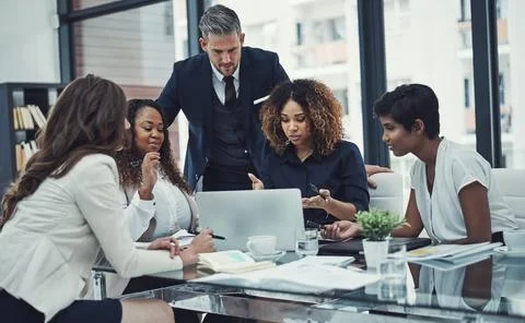 First comes the plan then comes the implementation. a group of colleagues having Stock Photos