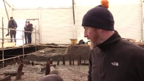 First complete Bronze Age wheel discovered at British Pompeii  - INT &amp; GVs Stock Footage 149129137