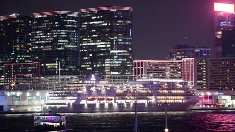 The first cruise ship in three years sails into Hong Kong. Stock Footage 230777529