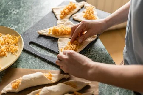 The first culinary experience. Spread out the apple filling. View from above Stock Photos