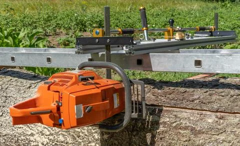 First cut with mobile chainsaw mill Stock Photos