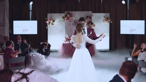 The first dance of the bride and groom with white smoke Stock Footage 166468681