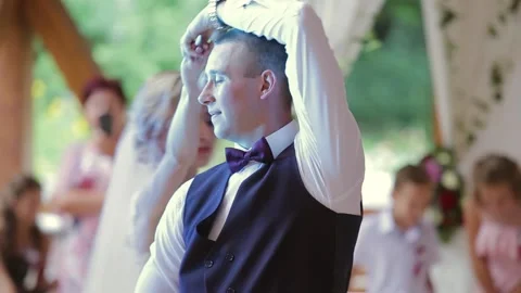 First dance of wedding pair in flying gold confetti. Stock Footage 233712573
