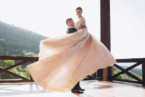 The first dance of the young. The bride and groom are dancing their first dance. Stock Photos