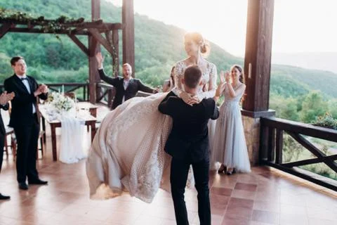 The first dance of the young. The bride and groom are dancing their first dance. Stock Photos
