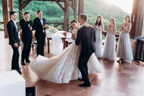 The first dance of the young. The bride and groom are dancing their first dance. Stock Photos