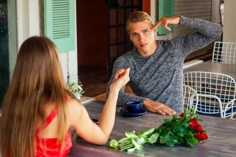 First date spending time together ignoring real communication bored conversation Stock Photos