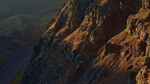 First dawn light at sunrise over barren desert mountain summit of Steens Stock Footage 82006109
