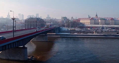 First, the drone flies along the bridge that connects both banks of the Vistu Stock Footage 112150234