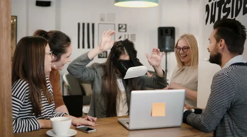 First experience with virtual reality glasses young team supports young Stock Footage 68727329