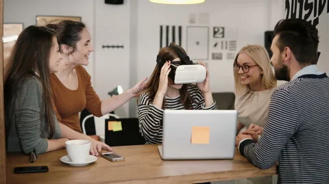 First experience with virtual reality glasses young team supports young Stock Footage 68727779