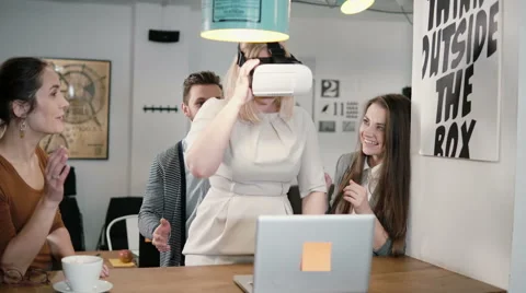 First experience with virtual reality glasses young team supports young Stock Footage 68729542