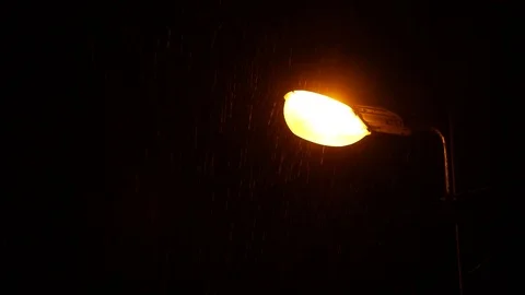 The first falling snow on the background of a lamppost Stock Footage 121246686