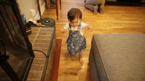 First Few Steps of Baby Learning to Walk Stock Footage 94077539