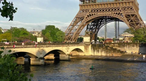 First floor of the Eiffel Tower and Iena bridge traffic Stock Footage 37678365