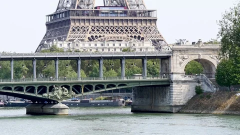 First floor of the Eiffel Tower in front of the bir-hakeim birdge in Paris. Stock Footage 94353540