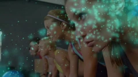 First frame teal overlay drifting across faces, class leaning forward training Stock Footage 330563731