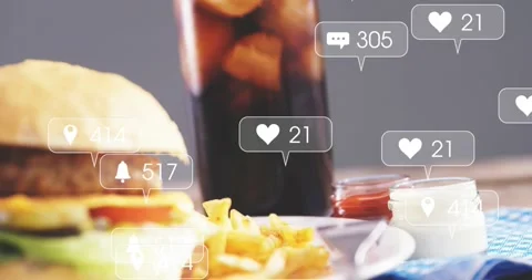 First frames starting bubbles around tall cola, camera panning to burger and Video stock 323272161