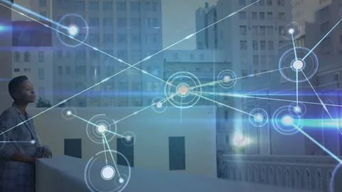 First glowing node driving technology network spread across skyline while woman Stock Footage 309722950