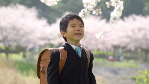 A First Grader Boy Who Plays Rock-Paper-Scissors with Scissors Video stock 331979729
