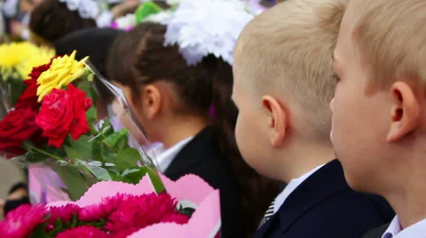 First-graders With Flowers Stock Footage 39440209