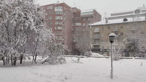 First heavy snowfall hit the city streets. Stock Footage 318729787