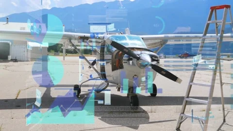 First holographic charts materializing around propeller airplane visualizing 스톡 동영상 319682316