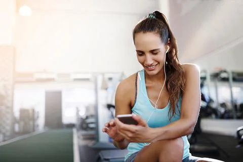 But first I've got to sort my workout tunes Foto stock